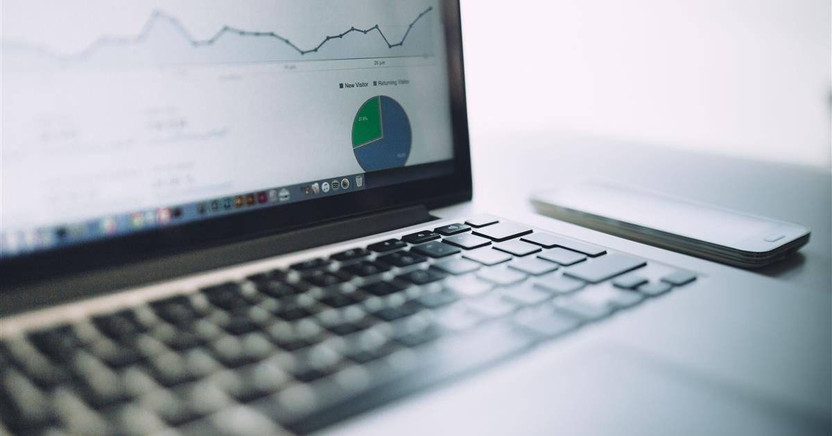 Website analytics displayed on a laptop